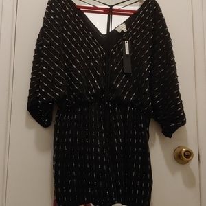 Layered with love sequined romper new with tags.